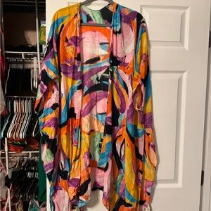 Women’s kimono.  Cute dressed up or worn as bathing suit cover up